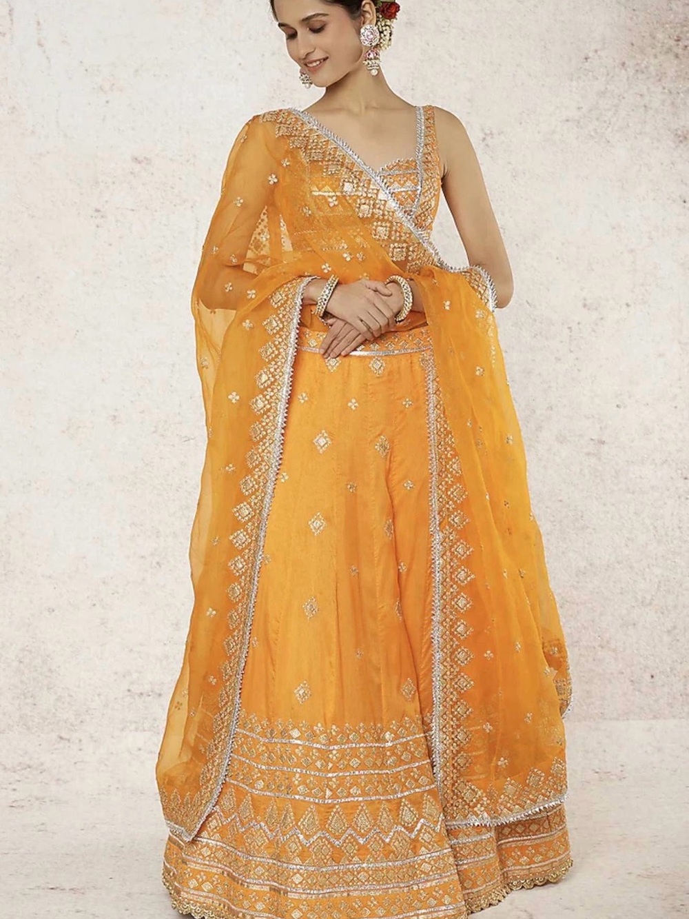 Embellished Orange Lehenga with Silver and Gold Detailing